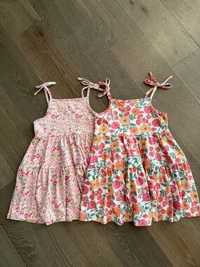 Set of 2 girls Btween floral dresses. Size:4T. Gently Used.